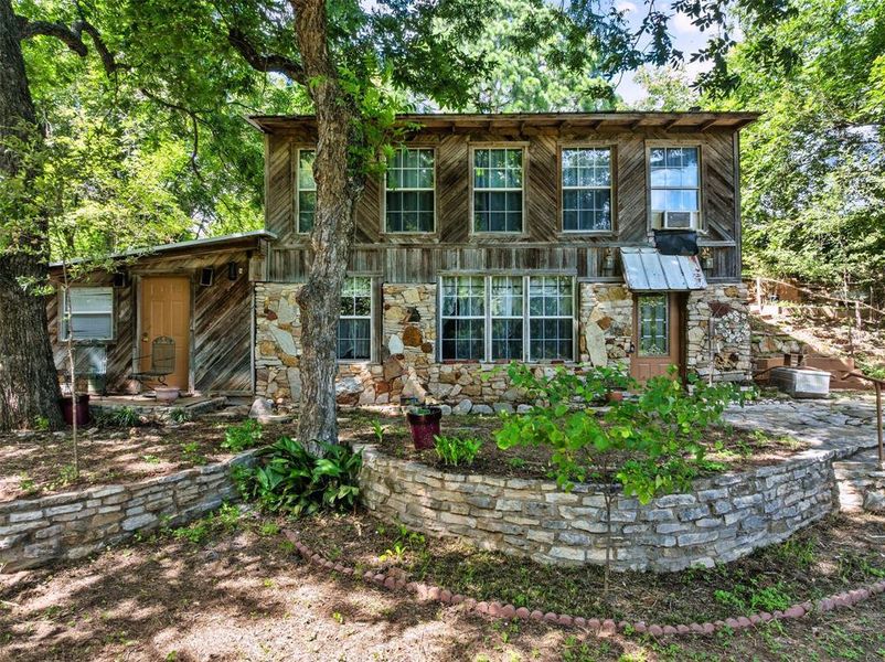 Front exterior of a new home in , Granbury, TX, highlighting curb appeal (Image 2). Front exterior of a new home in , Granbury, TX, highlighting curb appeal (Image 2).