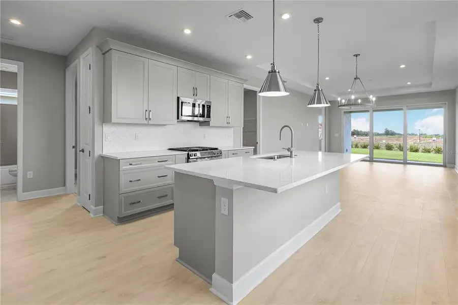 Furnished interior view inside a new home in Cresswind at Lake Harris, Tavares (Image 5).