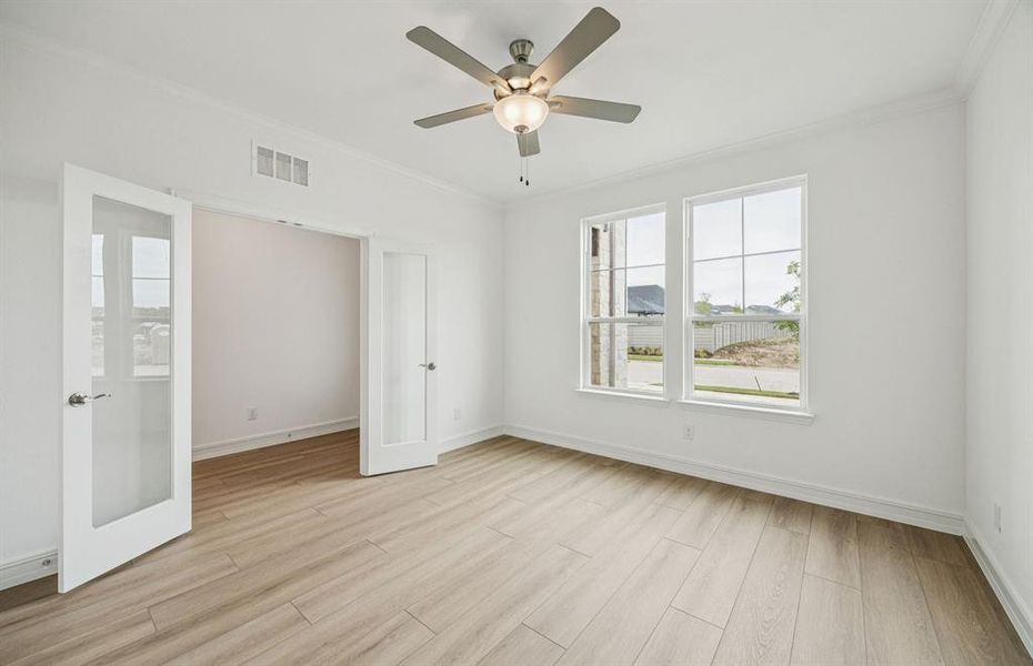 Elegant study featuring French doors for added sophistication *Real home pictured Elegant study featuring French doors for added sophistication *Real home pictured