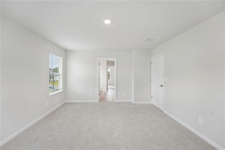Spacious, unfurnished interior of a new home in Northwoods at Mirror Lake, Villa Rica (Image 48).