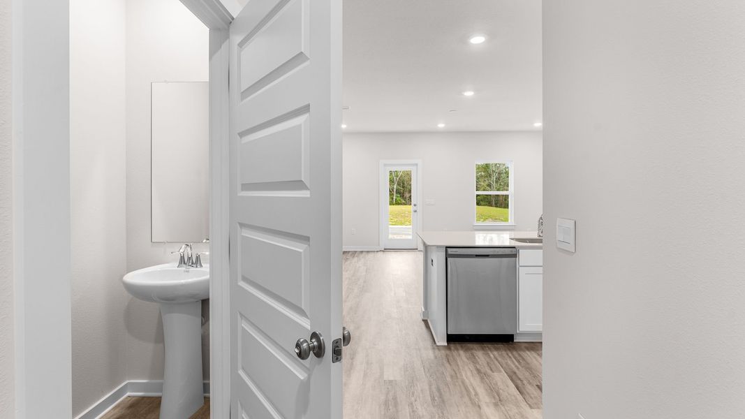 Representative furnished interior of a home built from the Palm Interior by D.R. Horton in Genoa Landing Townhomes, Freeport (Image 10).