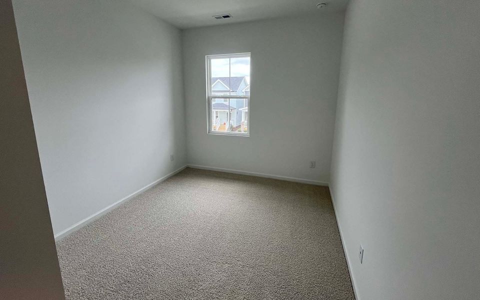 Spacious, unfurnished interior of a new home in Townhomes at Wendell Falls, Wendell (Image 13).