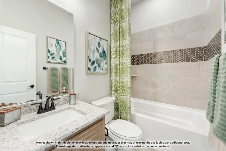 Bathroom with granite vanity, tiled tub-shower combo, and mosaic accent strip on walls