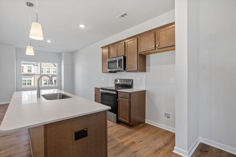 Furnished interior view inside a new home in Renaissance at White Oak, Garner (Image 8).