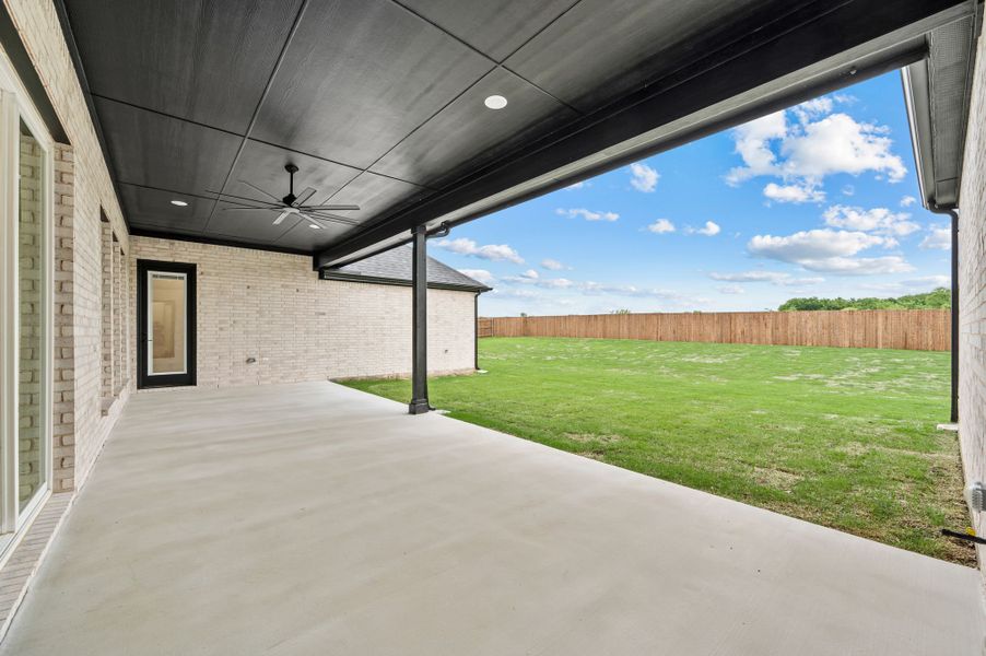 Exterior details and patio area of a home in Highland Oaks, Boyd (Image 3). Exterior details and patio area of a home in Highland Oaks, Boyd (Image 3).