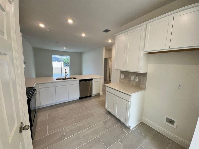 Furnished interior view inside a new home in Palm Coast: Cornerstone Collection, Palm Coast (Image 8).