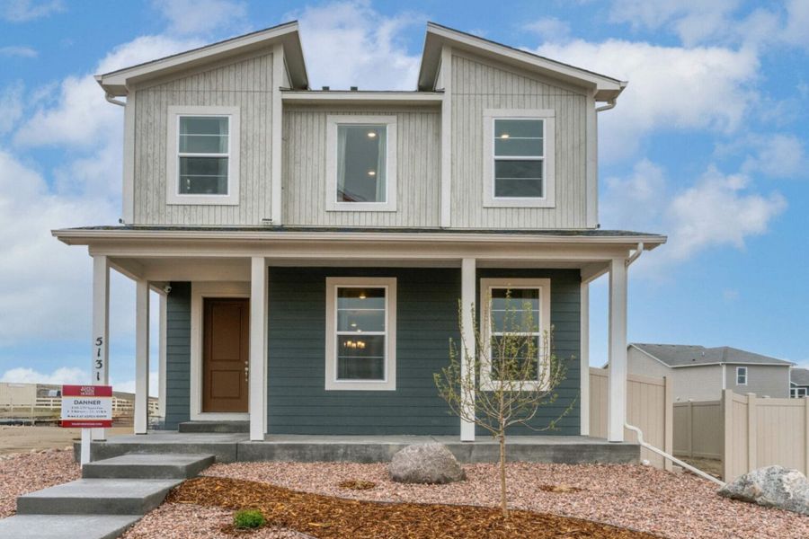 Front exterior of a new home in The Trails at Aspen Ridge – Altitude Collection, Colorado Springs, CO, highlighting curb appeal (Image 26). Front exterior of a new home in The Trails at Aspen Ridge – Altitude Collection, Colorado Springs, CO, highlighting curb appeal (Image 26).