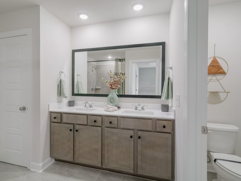 Representative furnished interior of a home built from the The Carson by Cothran Homes in Reidville Town Center, Reidville (Image 29).