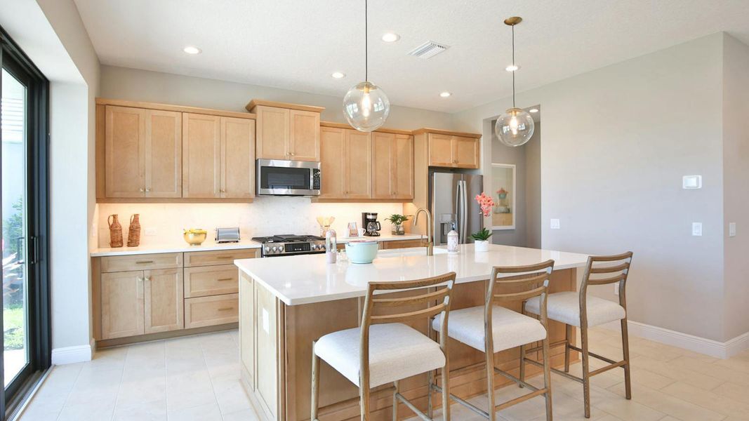 Furnished interior view inside a new home in Grand Park Real Estate and Homes for Sale in Sarasota, FL - Neal Communities, Sarasota (Image 11).