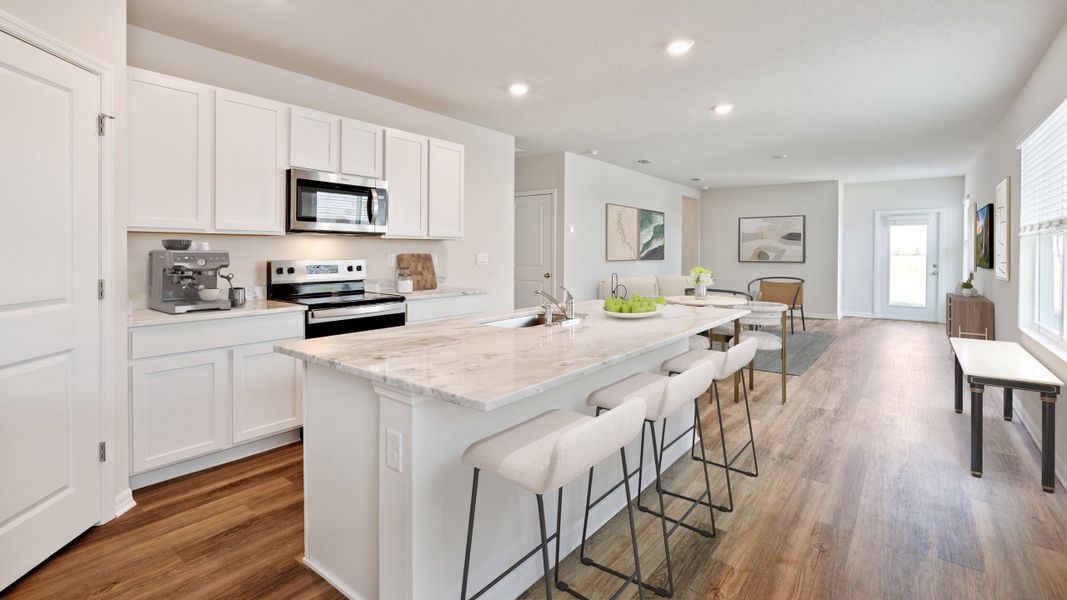 Furnished interior view inside a new home in Oakfield Trails, Parrish (Image 3).
