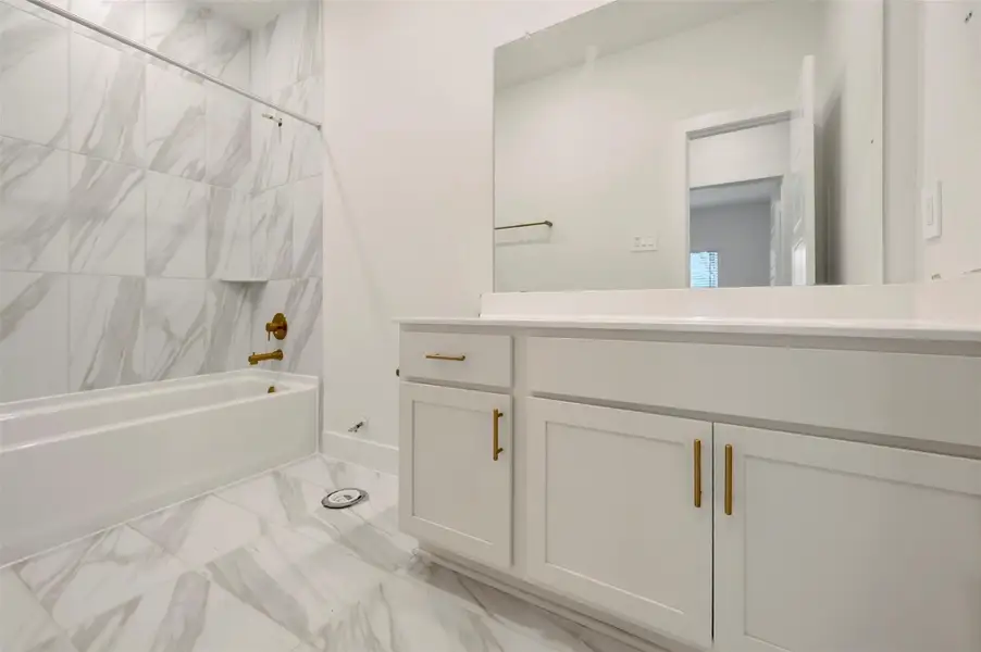 Furnished interior view inside a new home in Sorella, Tomball (Image 11).