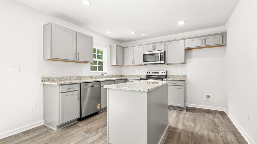 Furnished interior view inside a new home in Greystone North, Stoneville (Image 9).