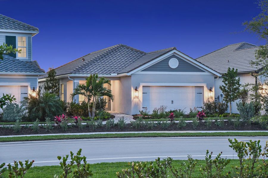 Representative exterior photo of a completed home built from the Dream 2 by Neal Communities in SkySail, Naples, FL (Image 21).