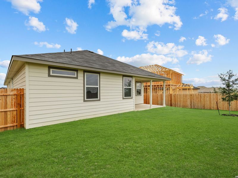 Exterior details and patio area of a home in Hickory Ridge, San Antonio (Image 24).