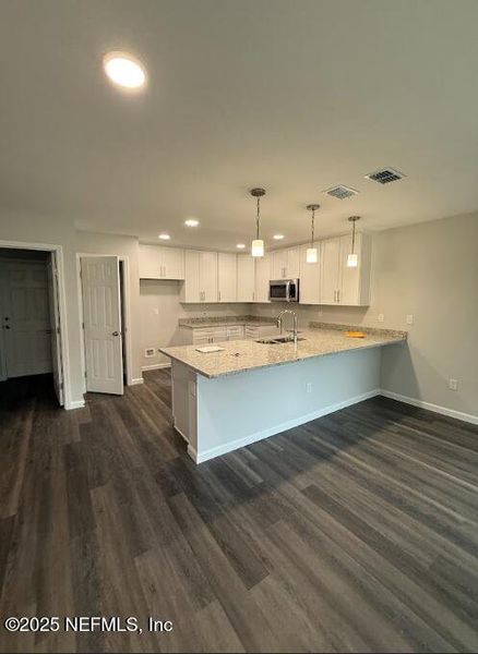 Furnished interior view inside a new home in , Jacksonville (Image 13).