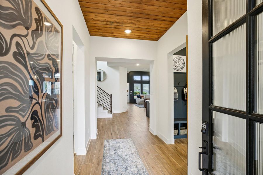 Furnished interior view inside a new home in Bridgeland, Cypress (Image 9).