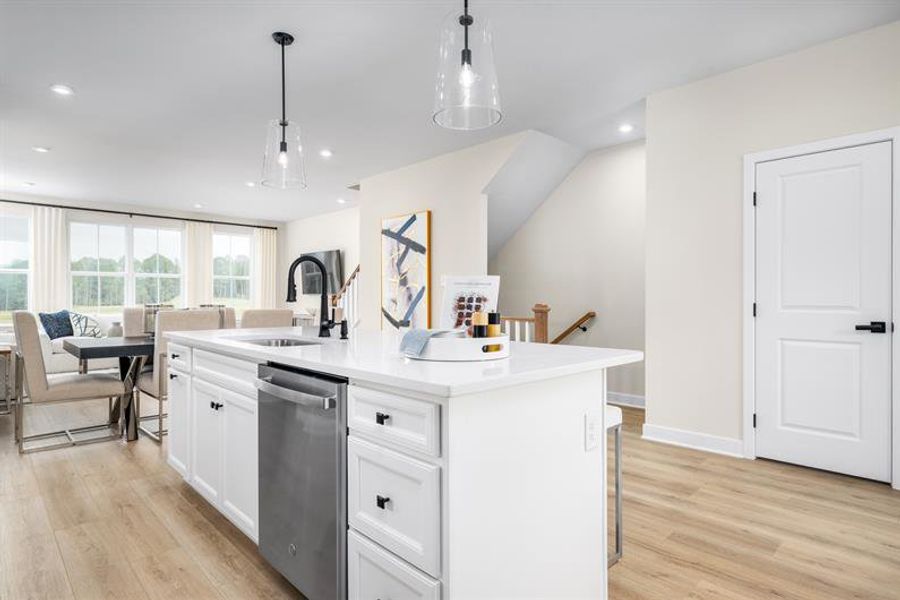Representative furnished interior of a home built from the Schuman by Ryan Homes in Stowe Branch Townhomes, Charlotte (Image 5).