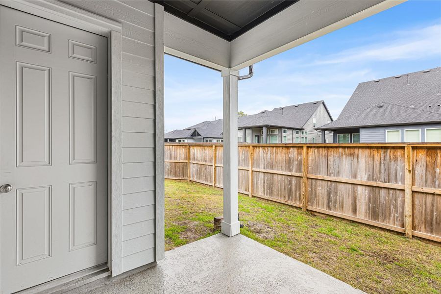 Exterior details and patio area of a home in , Humble (Image 3).