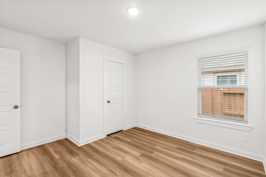 Spacious, unfurnished interior of a new home in Pinewood at Grand Texas, New Caney (Image 18). Spacious, unfurnished interior of a new home in Pinewood at Grand Texas, New Caney (Image 18).