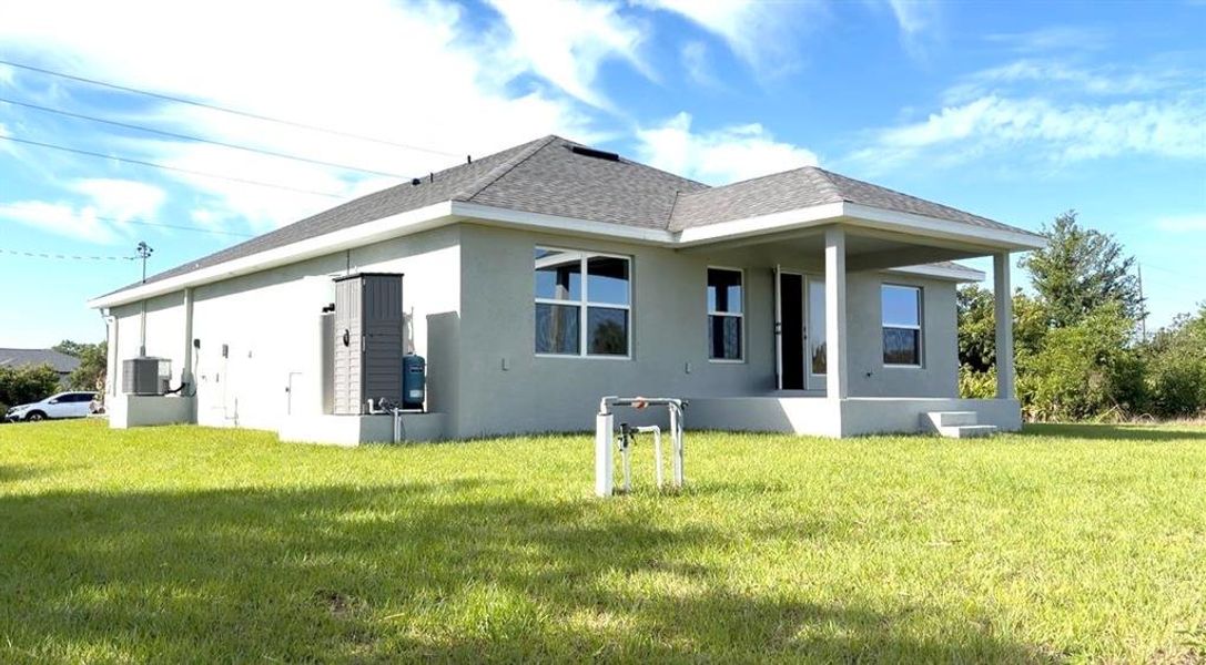Exterior details and patio area of a home in Port Charlotte, Port Charlotte (Image 3).