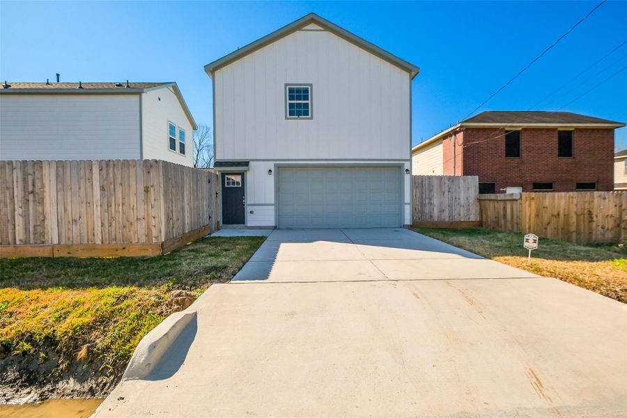 Front exterior of a new home in , Houston, TX, highlighting curb appeal (Image 26).
