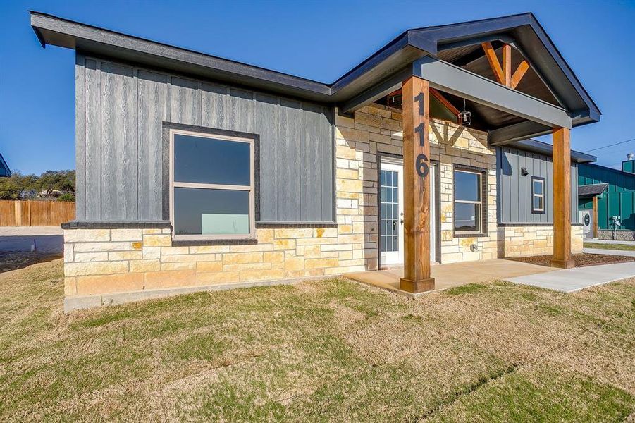 Exterior details and patio area of a home in , Azle (Image 18).