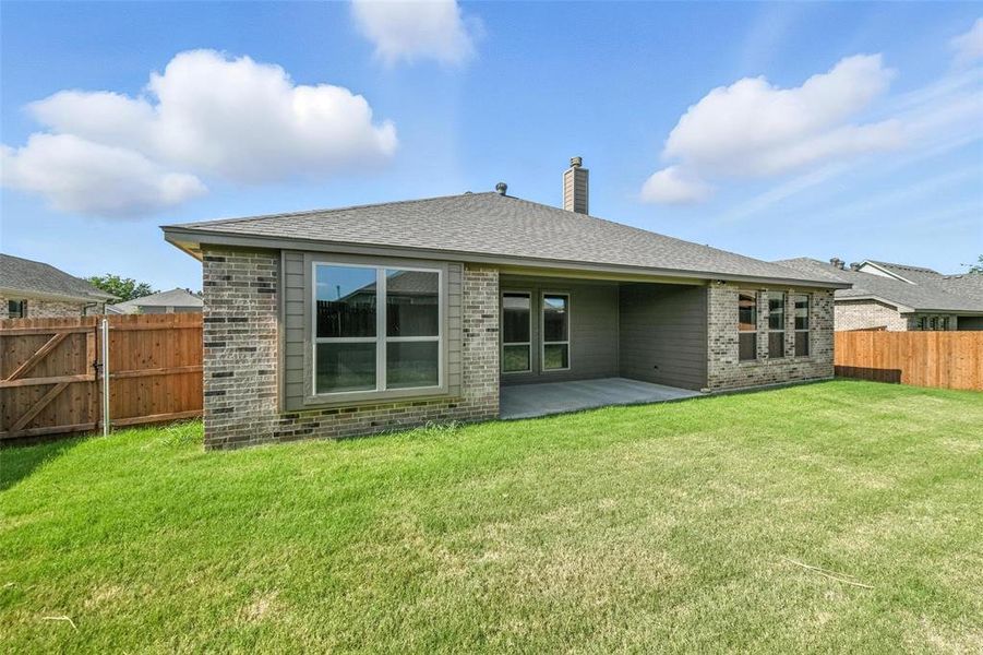 Front exterior of a new home in Willow Vista Estates, Saginaw, TX, highlighting curb appeal (Image 2). Front exterior of a new home in Willow Vista Estates, Saginaw, TX, highlighting curb appeal (Image 2).