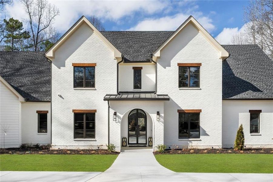 Front exterior of a new home in , Alpharetta, GA, highlighting curb appeal (Image 24). Front exterior of a new home in , Alpharetta, GA, highlighting curb appeal (Image 24).