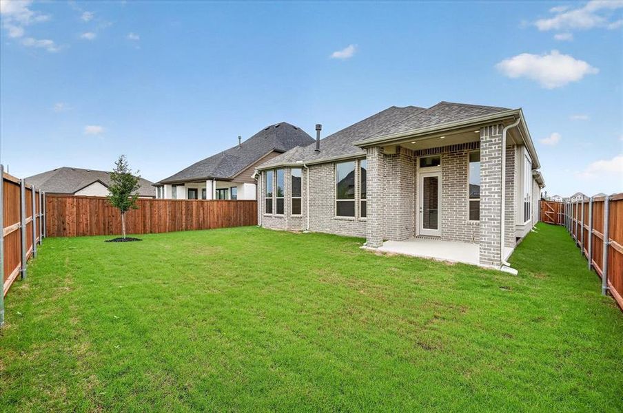 Exterior details and patio area of a home in Wellington, Haslet (Image 2). Exterior details and patio area of a home in Wellington, Haslet (Image 2).