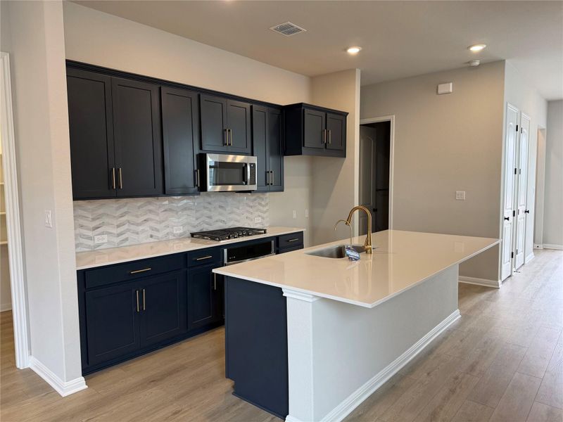 Furnished interior view inside a new home in Cannon Ranch 40s, Dripping Springs (Image 8).
