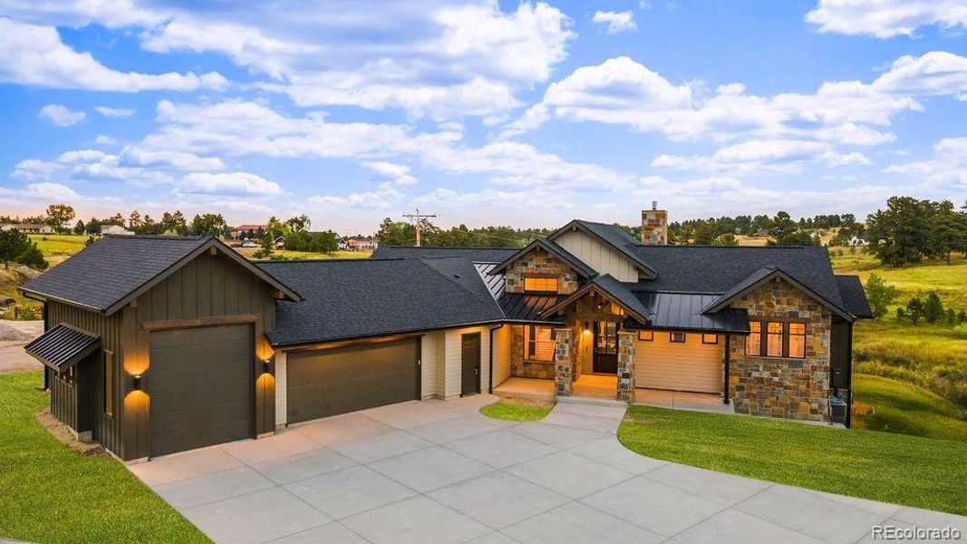 Welcome home to 10201 Inspiration Drive in Parker, CO where luxury meets the land.