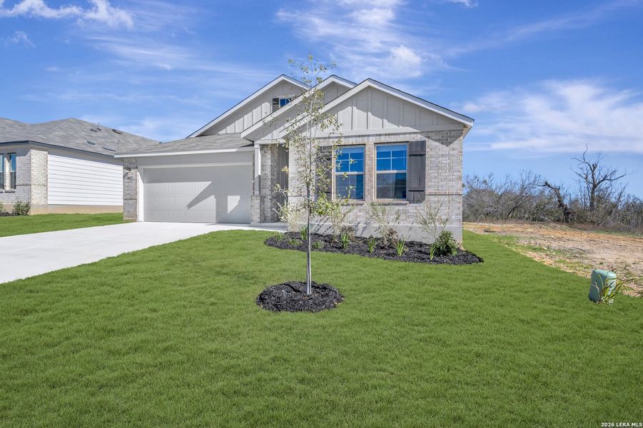 Front exterior of a new home in Greenspoint Heights, Seguin, TX, highlighting curb appeal (Image 19).