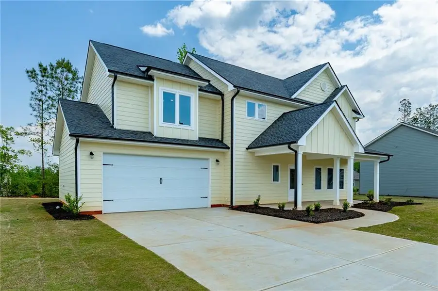 Front exterior of a new home in , Toccoa, GA, highlighting curb appeal (Image 28).