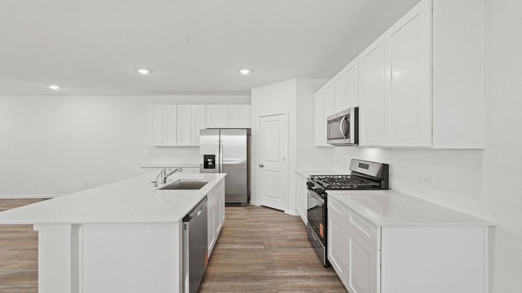 Furnished interior view inside a new home in Sunterra, Katy (Image 6).