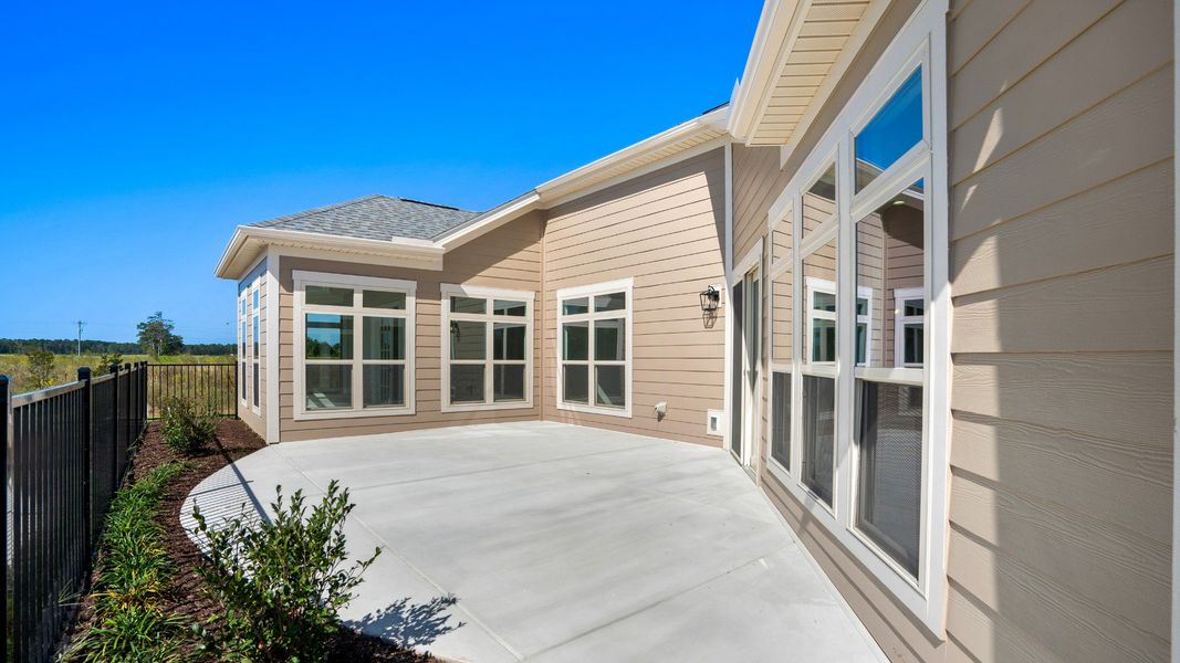 Representative exterior details of a home built from the Promenade III by Epcon Communities in Courtyards by Carrell, Ocean Isle Beach (Image 3). Representative exterior details of a home built from the Promenade III by Epcon Communities in Courtyards by Carrell, Ocean Isle Beach (Image 3).