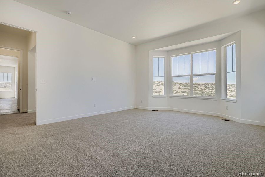 Spacious, unfurnished interior of a new home in Macanta: The Legends Collection, Castle Rock (Image 11).