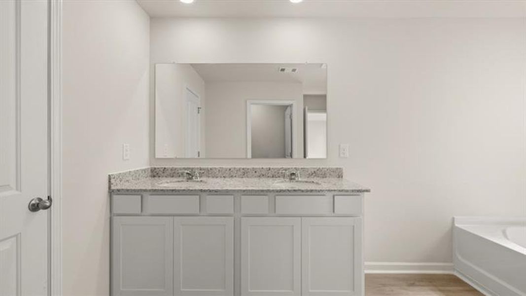 Furnished interior view inside a new home in Rolling Meadows, Jasper (Image 5). Furnished interior view inside a new home in Rolling Meadows, Jasper (Image 5).
