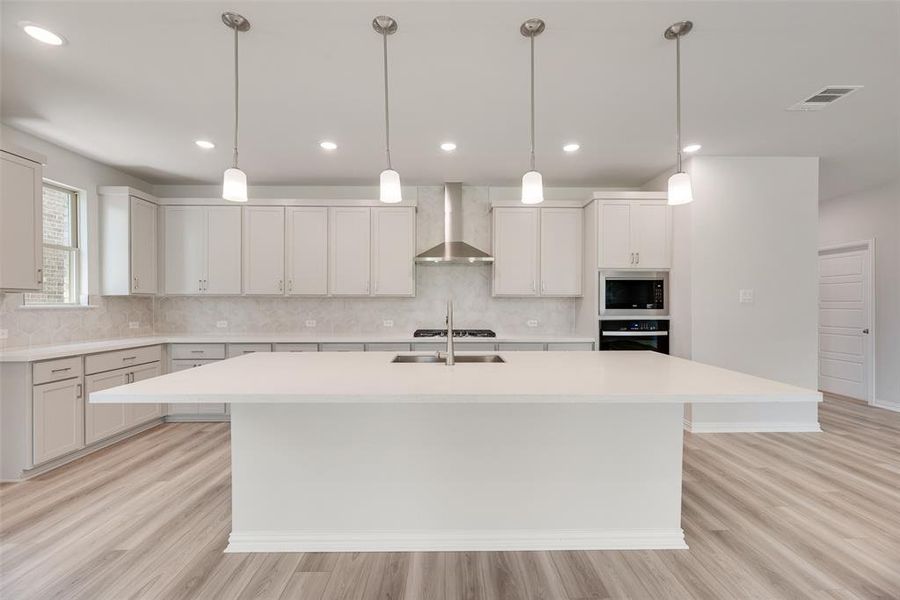 Furnished interior view inside a new home in Valencia On The Lake, Little Elm (Image 11).