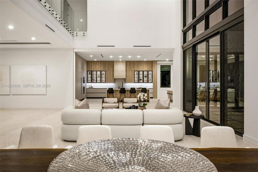 Open-Plan Dining & Kitchen | Double-Height Volume | Custom Cabinetry | Pinecrest FL Open-Plan Dining & Kitchen | Double-Height Volume | Custom Cabinetry | Pinecrest FL