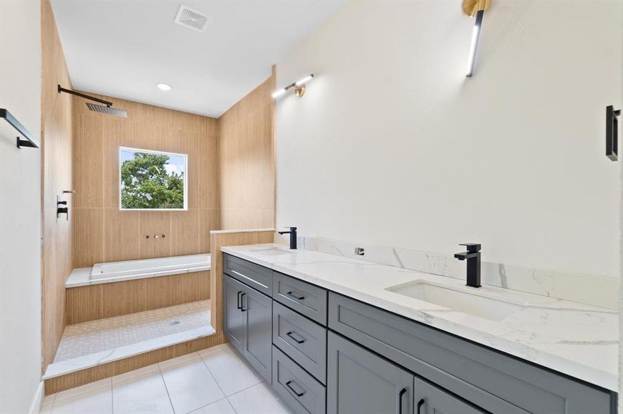 Stunning primary bathroom with walk-in shower and tub combo