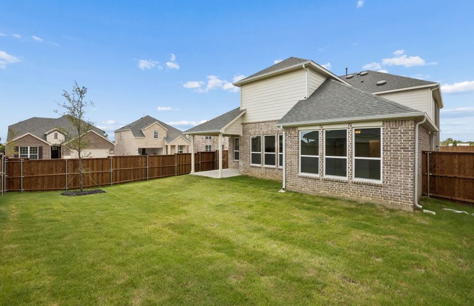 Exterior details and patio area of a home in Creekview Meadows, Pilot Point (Image 3). Exterior details and patio area of a home in Creekview Meadows, Pilot Point (Image 3).