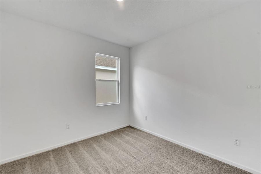 Spacious, unfurnished interior of a new home in Annabelle Estates, Winter Haven (Image 27).