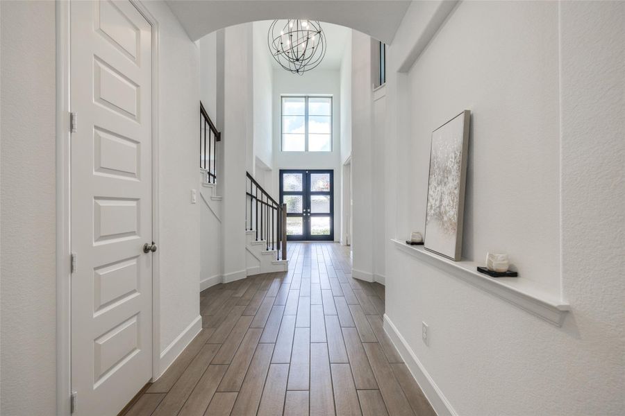 Gorgeous Perry Home filled with natural light, easy to maintain tile floors throughout the main living area.