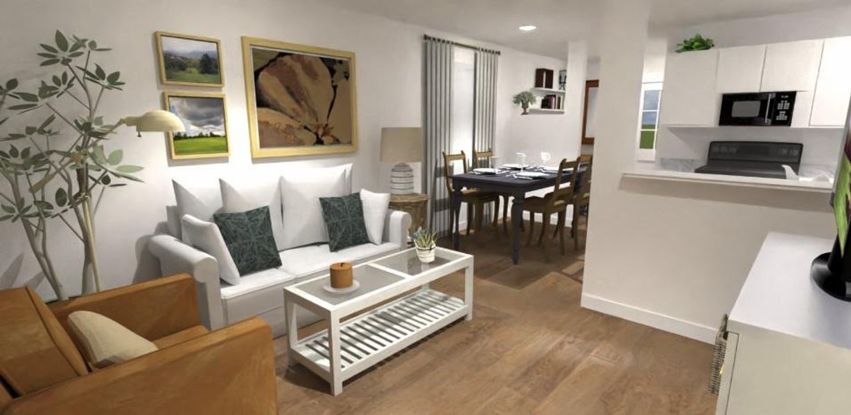 Living room with wood finished floors and recessed lighting