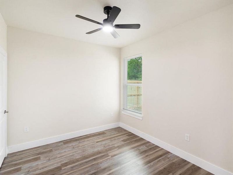Neutral-toned walls complement the wood-finish flooring Neutral-toned walls complement the wood-finish flooring