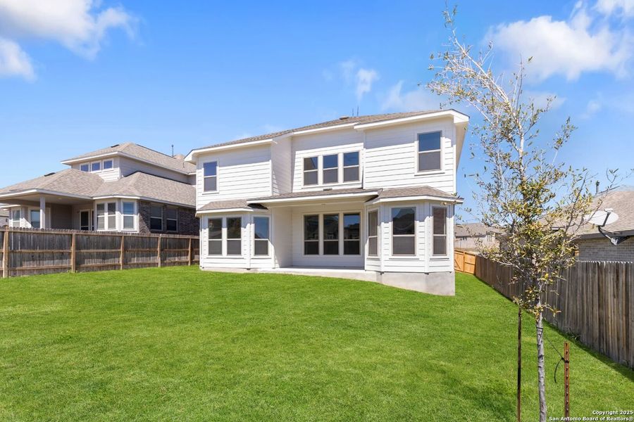 Front exterior of a new home in Ladera, San Antonio, TX, highlighting curb appeal (Image 19). Front exterior of a new home in Ladera, San Antonio, TX, highlighting curb appeal (Image 19).