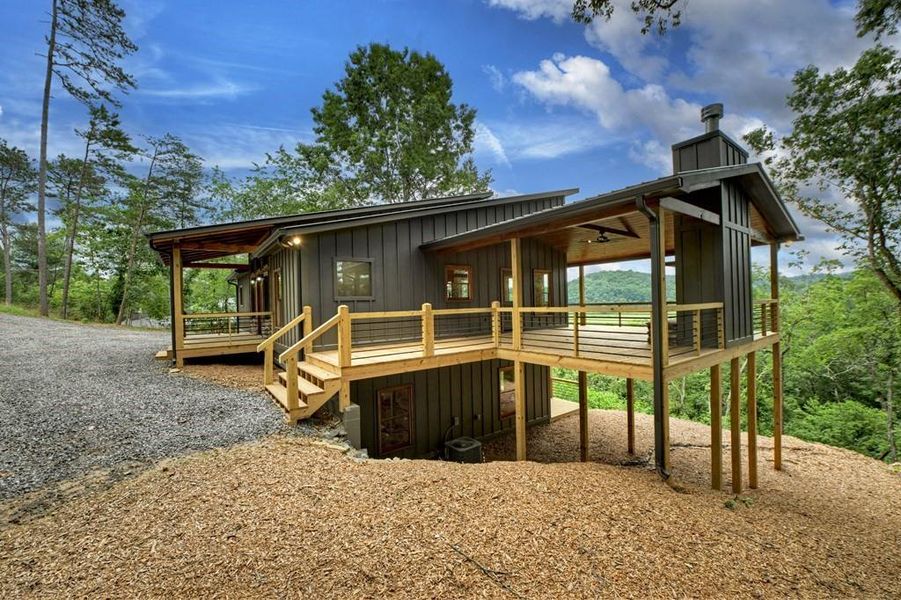 Front exterior of a new home in , Blue Ridge, GA, highlighting curb appeal (Image 27).