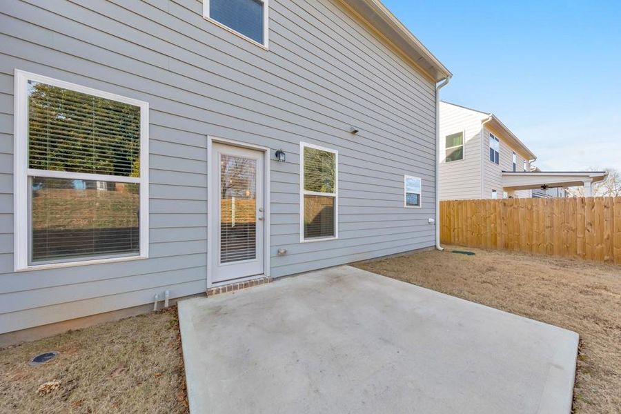 Exterior details and patio area of a home in Old Lost Mountain Estates, Powder Springs (Image 4).