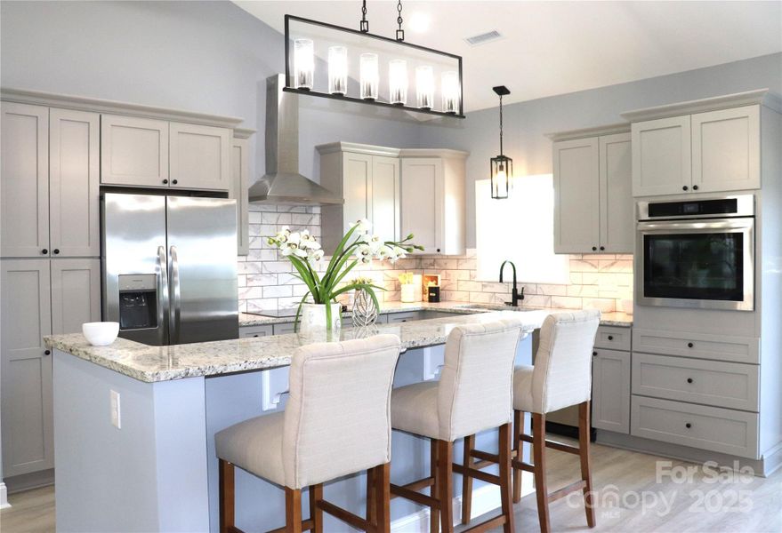 Furnished interior view inside a new home in , Lenoir (Image 9).