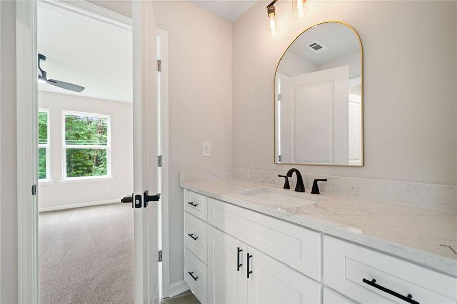Furnished interior view inside a new home in , White (Image 10). Furnished interior view inside a new home in , White (Image 10).